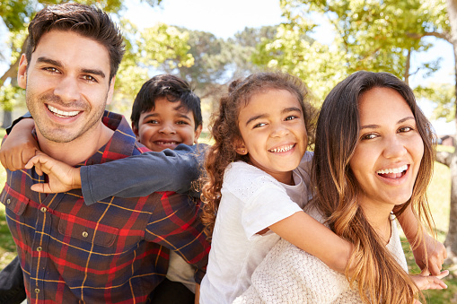 Smiling family at Grins & Giggles Family Dentistry in Spokane Valley, WA